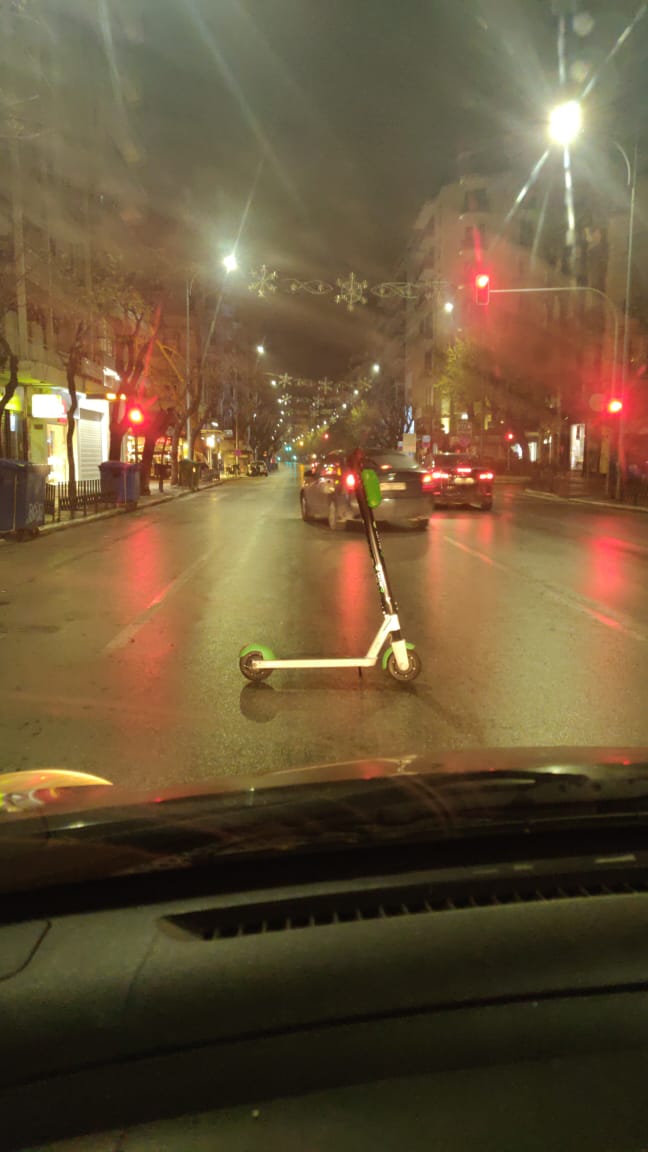 Lime Scooter in the middle of the road